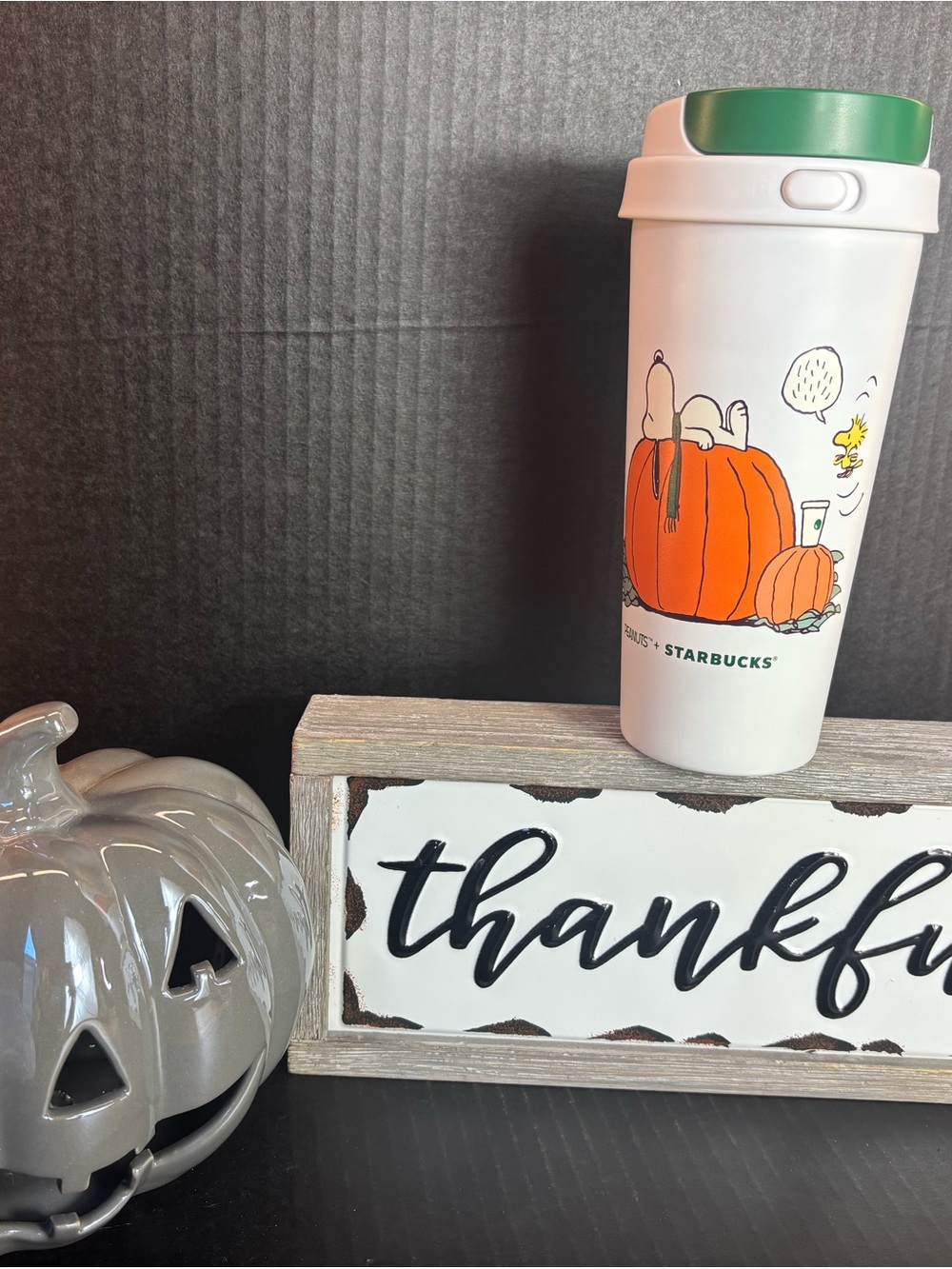 Starbucks Snoopy White Tumbler with Green Lid and Orange Pumpkin Illustration